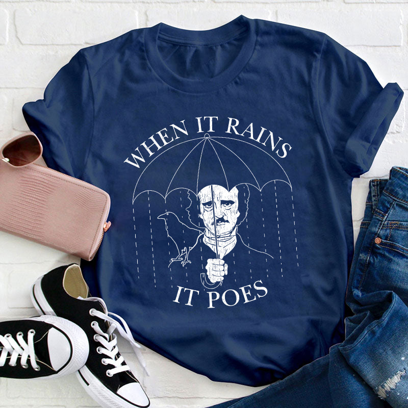 When It Rains It Poes Teacher T-Shirt