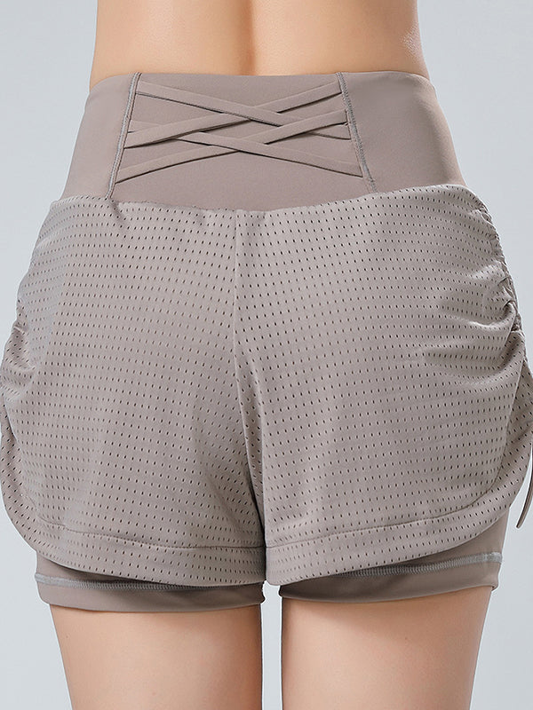 Drawstring Hollow Pockets Solid Color Sports Shorts