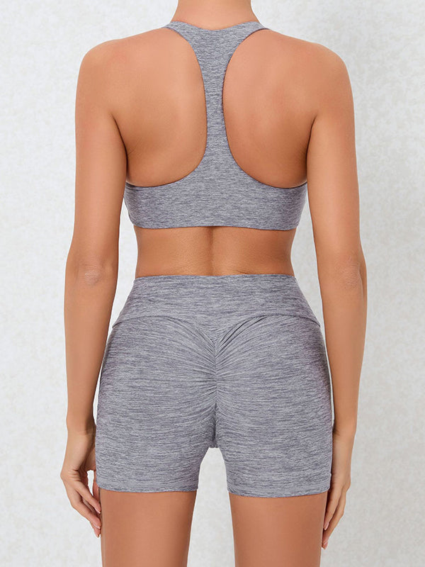 Skinny Hollow Pockets Solid Color Halter-Neck Sports Bra&Shorts Suits