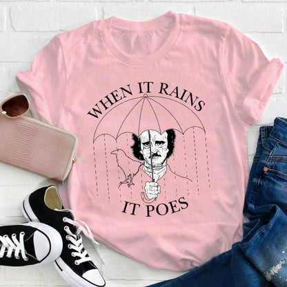 When It Rains It Poes Teacher T-Shirt
