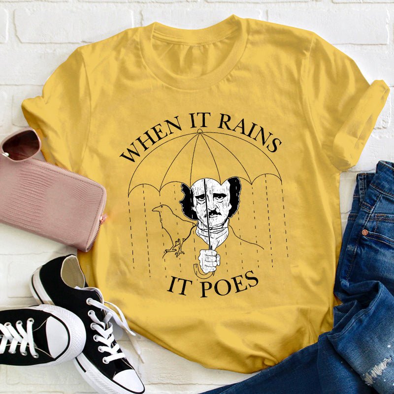 When It Rains It Poes Teacher T-Shirt