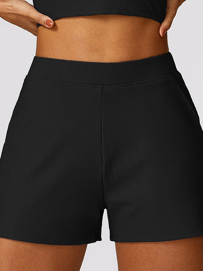 Wrap Pockets Solid Color Sports Shorts