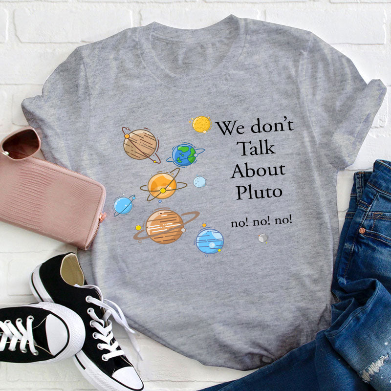 We Don't Talk About Pluto Teacher T-Shirt