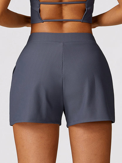 Wrap Pockets Solid Color Sports Shorts