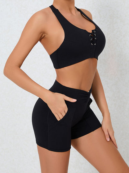 Skinny Hollow Pockets Solid Color Halter-Neck Sports Bra&Shorts Suits