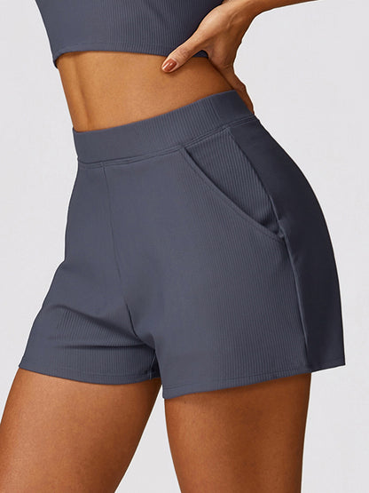 Wrap Pockets Solid Color Sports Shorts