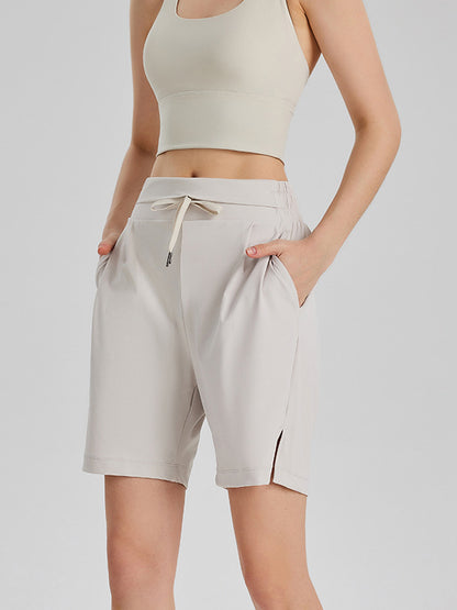 Loose Bandage Drawstring Elasticity Pockets Solid Color Sports Shorts